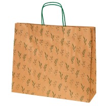 Bolsa de papel impresa con un estampado de hojas en color verde con asa retorcida o rizada.