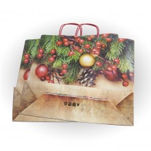 Bolsa de papel impresa para Navidad con asa retorcida o rizada. Bolsa de papel impresa para Navidad con asa retorcida o rizada.